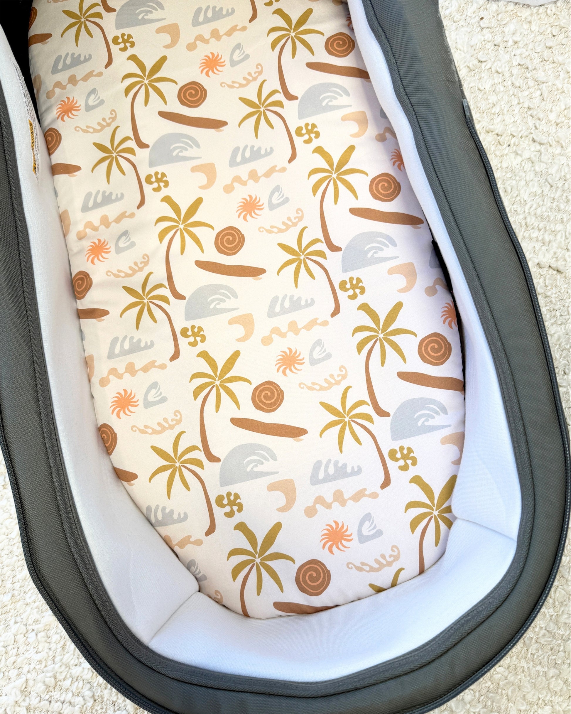 Bassinet liner for baby, comfy, soft and padded in a cute design. Made by harmony j.