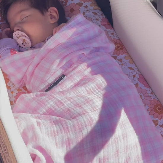 Beautiful sleeping baby in her pram with her hand made bassinet liner by harmony j.