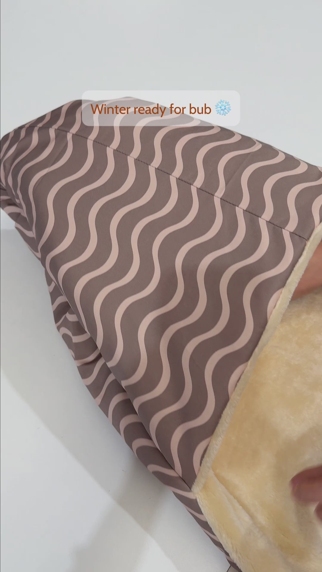 Waves Earth warm pram footmuff to keep your baby warm in winter and the cooler days.