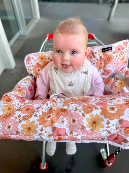 Adorable little girl and her pretty shopping trolley liner made by harmony j in white blossom fabric.